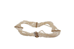 Bracelet ancien en or jaune avec perles fines, onyx et diamants - Castafiore