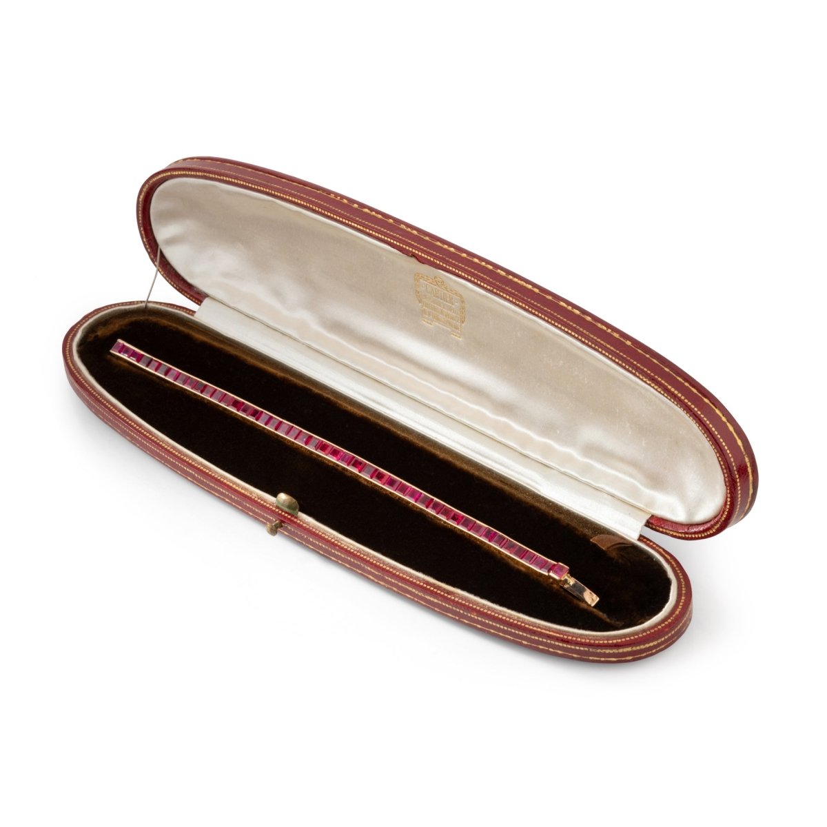Bracelet CARTIER Ligne tennis en or jaune et rubis - Castafiore