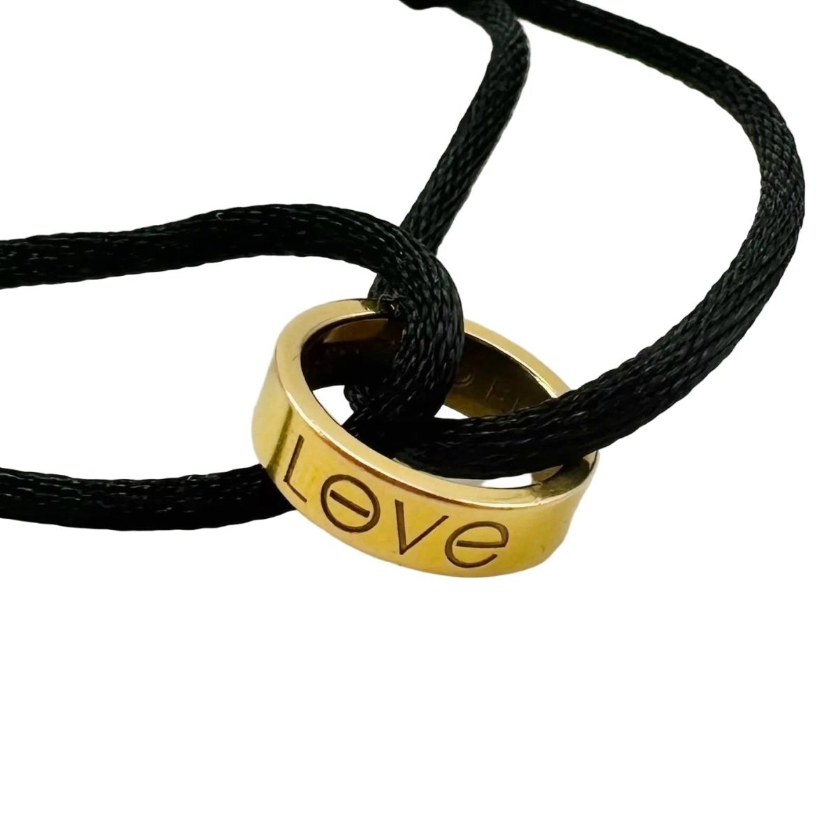 Bracelet CARTIER "Love" en or jaune et cordon - Castafiore