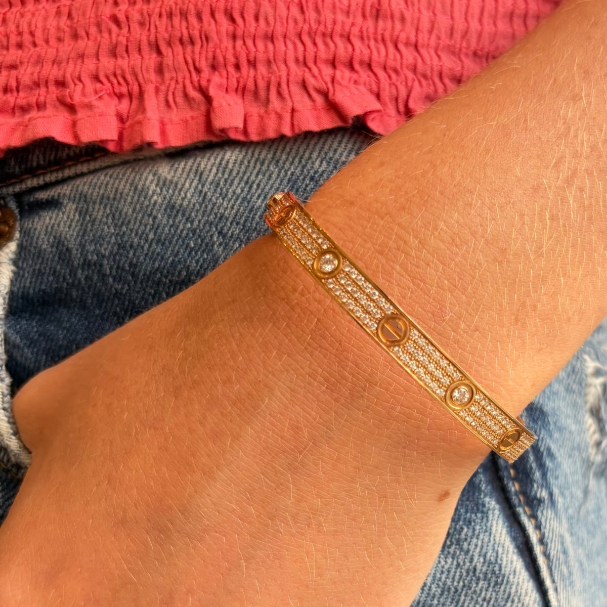 Bracelet CARTIER Love Classique en or rose et diamants
