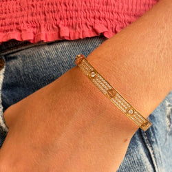 Bracelet CARTIER Love Classique en or rose et diamants