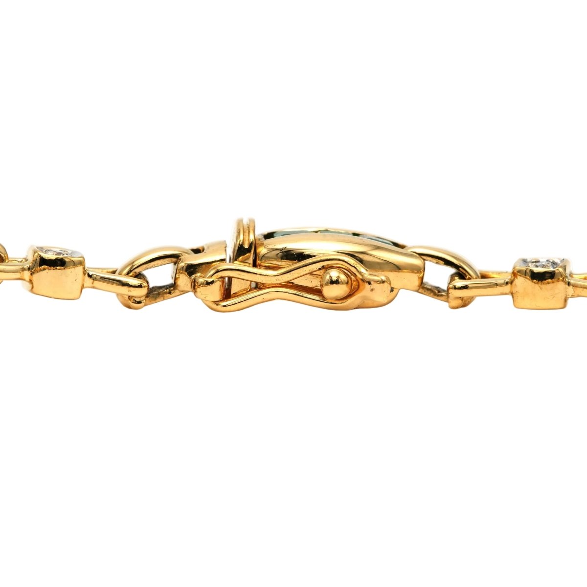 Bracelet en or jaune, émeraudes et diamants - Castafiore