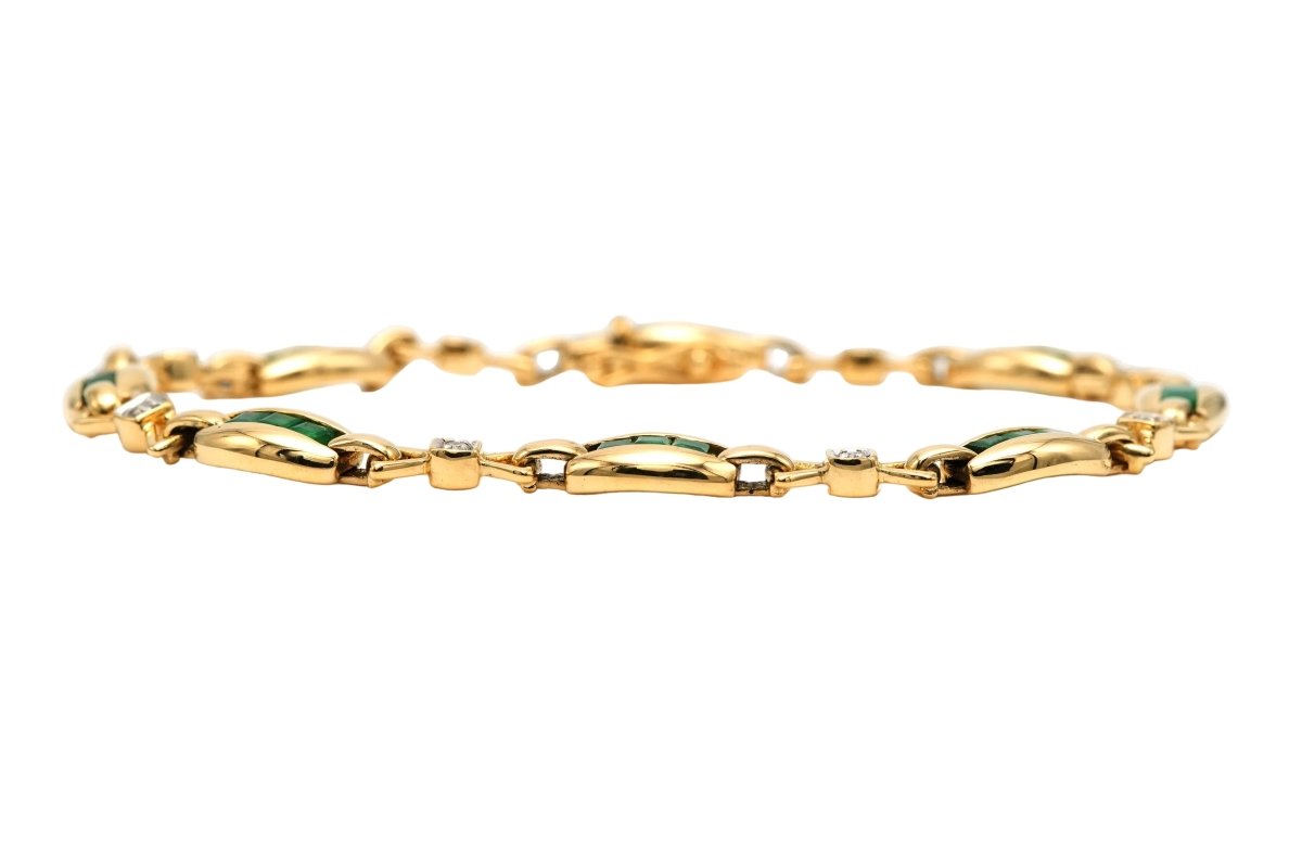 Bracelet en or jaune, émeraudes et diamants - Castafiore
