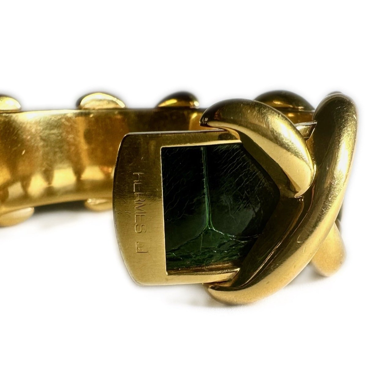 Bracelet HERMÈS Croisillons en métal doré et cuir de crocodile vert - Castafiore