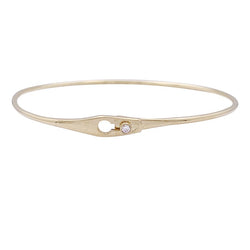 Bracelet Jonc DINH VAN "Serrure" en or jaune, et un diamant. - Castafiore