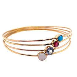 Bracelet Jonc en or jaune, opale, saphir, rubis et turquoise - Castafiore