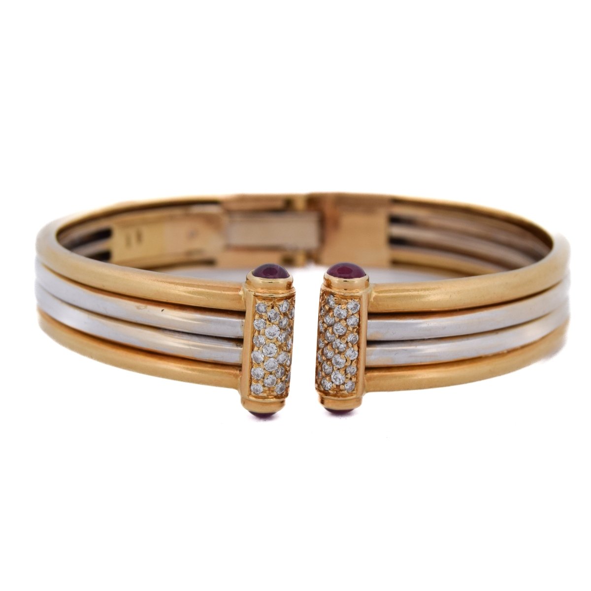 Bracelet Jonc PIAGET en or jaune, rubis et diamants - Castafiore