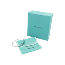 Bracelet Jonc TIFFANY & CO. "Tiffany T" en or blanc, turquoise et diamants - Castafiore