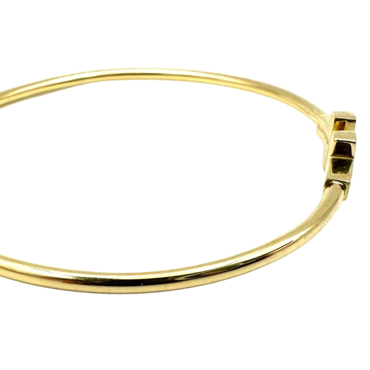 Bracelet Jonc TIFFANY & CO. "Tiffany T" en or jaune - Castafiore