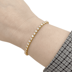 Bracelet Ligne CARTIER en or jaune et diamants. - Castafiore