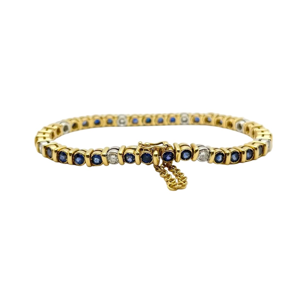 Bracelet Ligne en or blanc, or jaune, saphirs et diamants - Castafiore