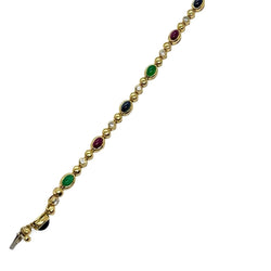 Bracelet Ligne en or jaune, saphirs, émeraudes, rubis et diamants - Castafiore