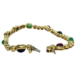 Bracelet Ligne en or jaune, saphirs, émeraudes, rubis et diamants - Castafiore