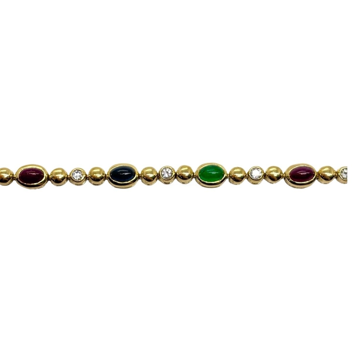 Bracelet Ligne en or jaune, saphirs, émeraudes, rubis et diamants - Castafiore