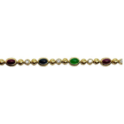 Bracelet Ligne en or jaune, saphirs, émeraudes, rubis et diamants - Castafiore