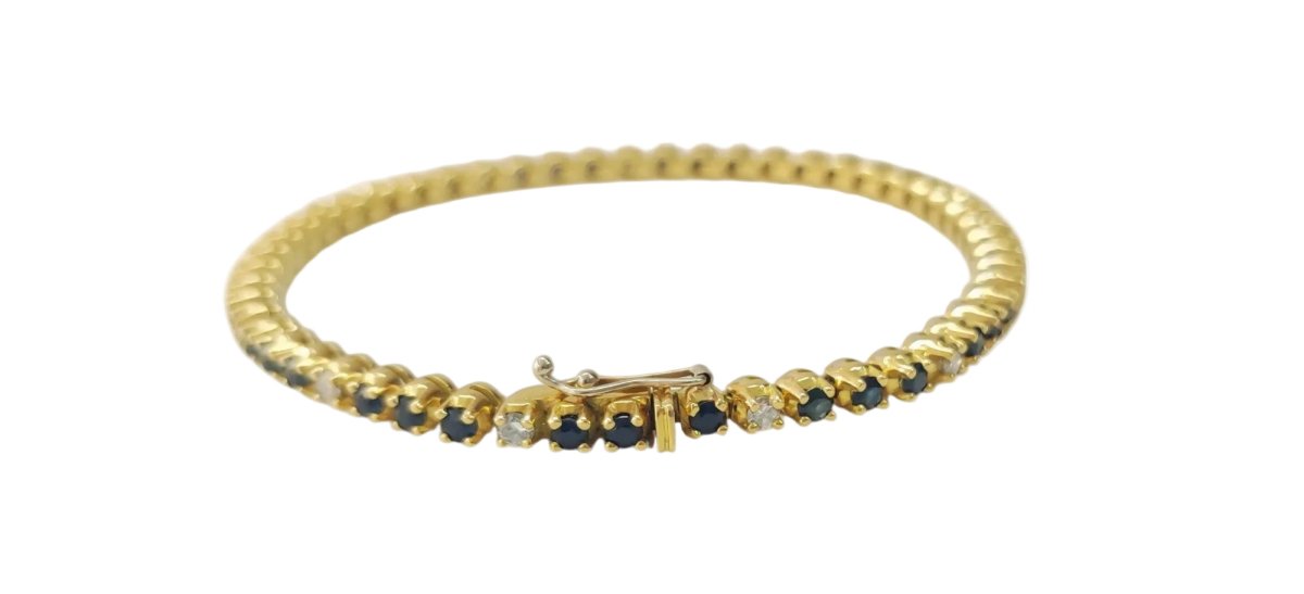 Bracelet Ligne en or jaune, saphirs et diamants - Castafiore