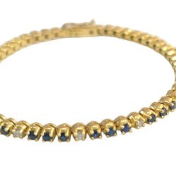 Bracelet Ligne en or jaune, saphirs et diamants - Castafiore
