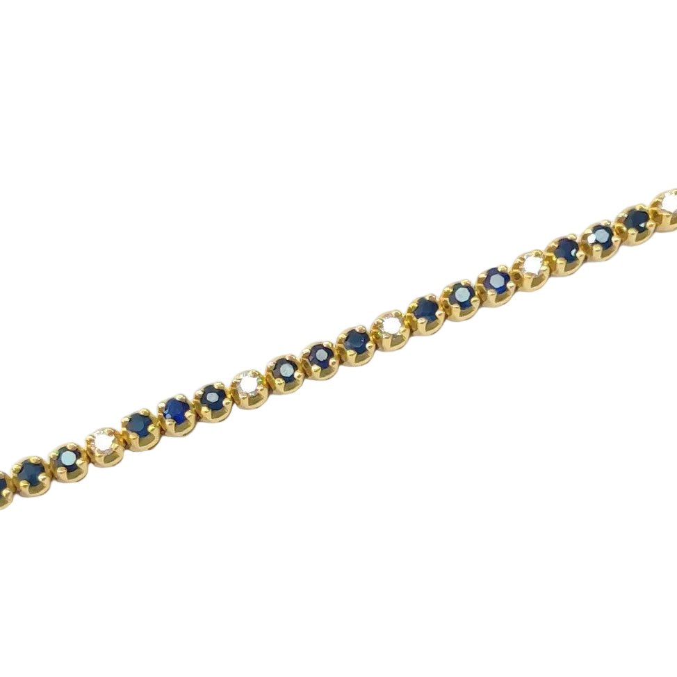 Bracelet Ligne en or jaune, saphirs et diamants - Castafiore
