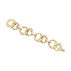Bracelet M. GERARD en or jaune, platine et diamants - Castafiore