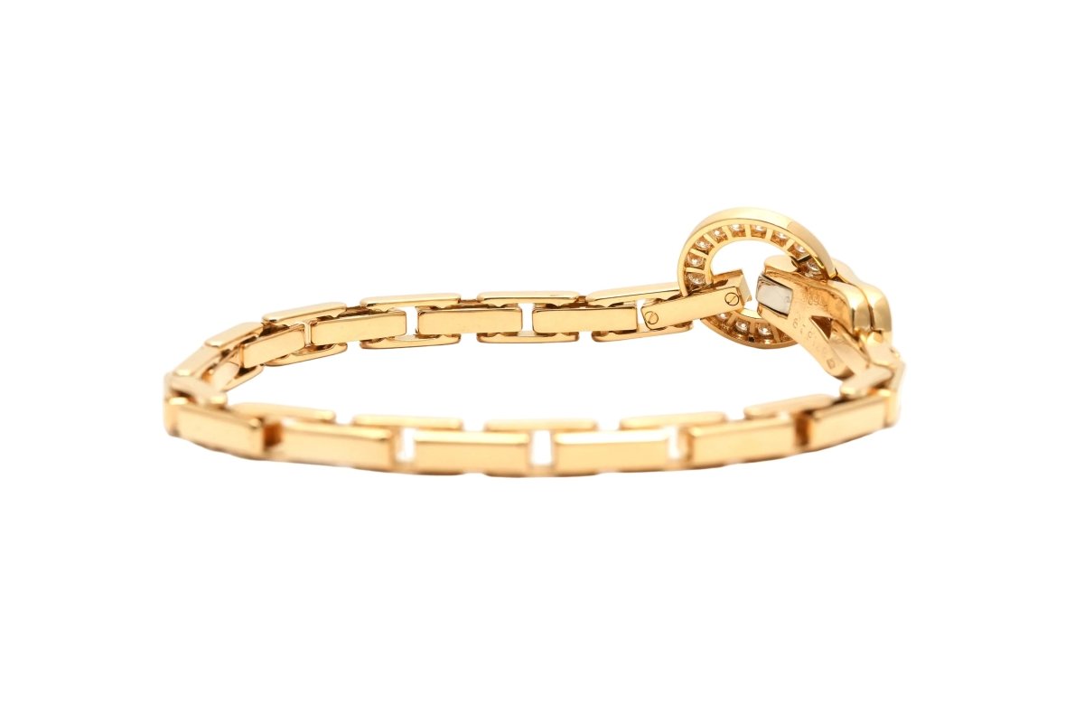 Bracelet Maille CARTIER "Agrafe" en or jaune et diamants - Castafiore