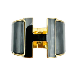 Bracelet Manchette HERMÈS "Clic Clac H" en métal et émail - Castafiore