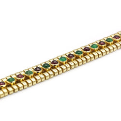 Bracelet MELLERIO en or jaune, émeraude et rubis - Castafiore