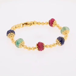 Bracelet or jaune et perles de rubis saphirs émeraudes en or jaune - Castafiore