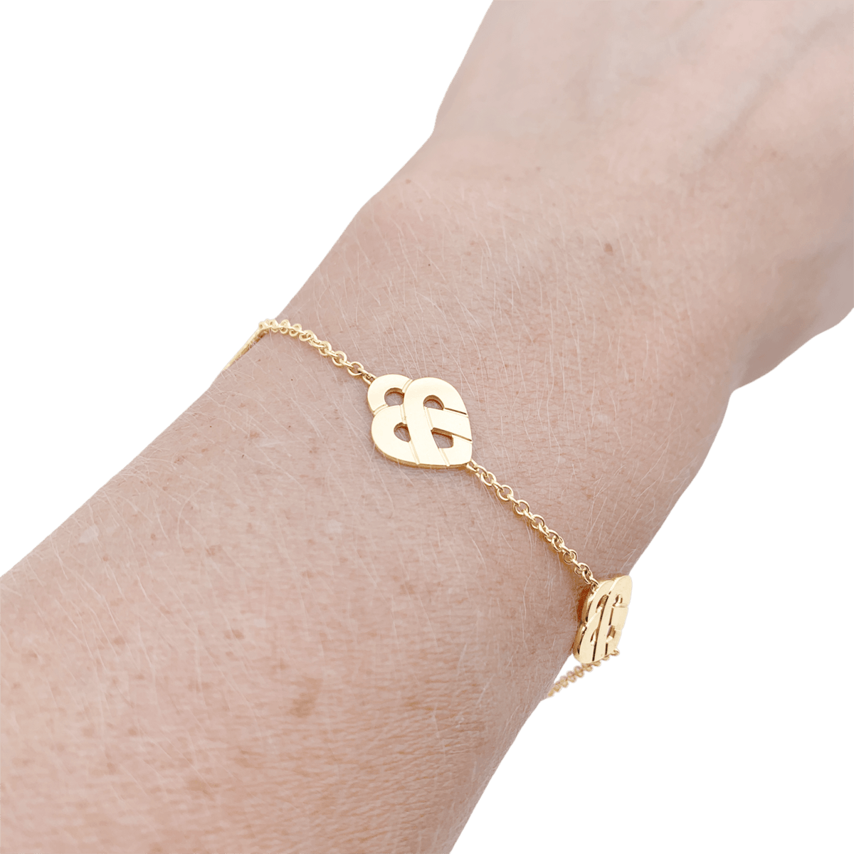 Bracelet POIRAY "Coeur entrelacé multi" en or jaune - Castafiore