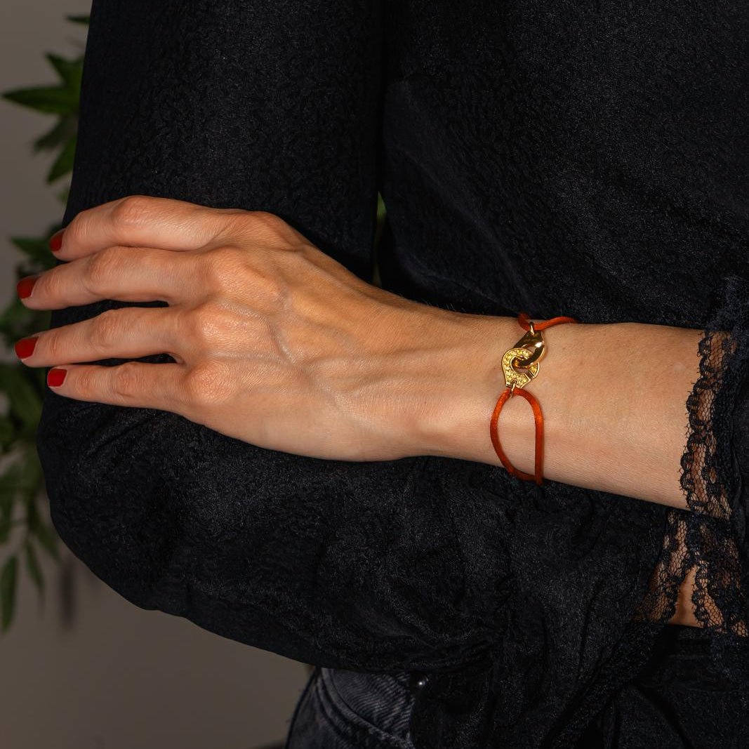 Bracelet Souple DINH VAN "Menottes R12" en or jaune et saphirs - Castafiore