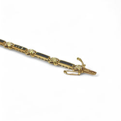 Bracelet souple en or jaune, saphirs et diamants - Castafiore