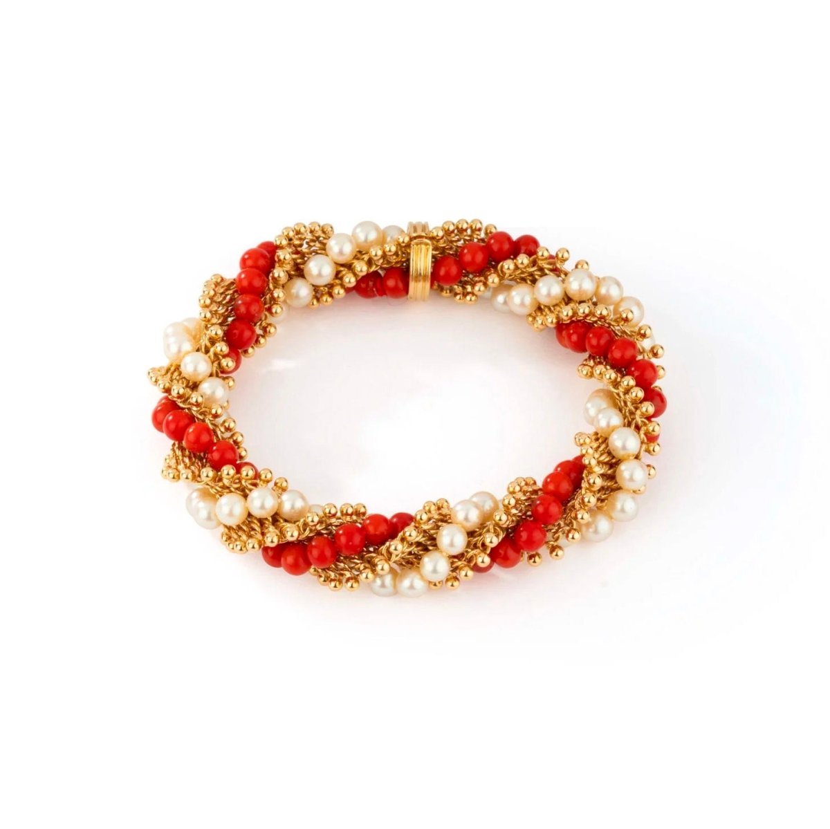 Bracelet VAN CLEEF & ARPELS, "Twist" or jaune, perles de corail et perles de culture - Castafiore