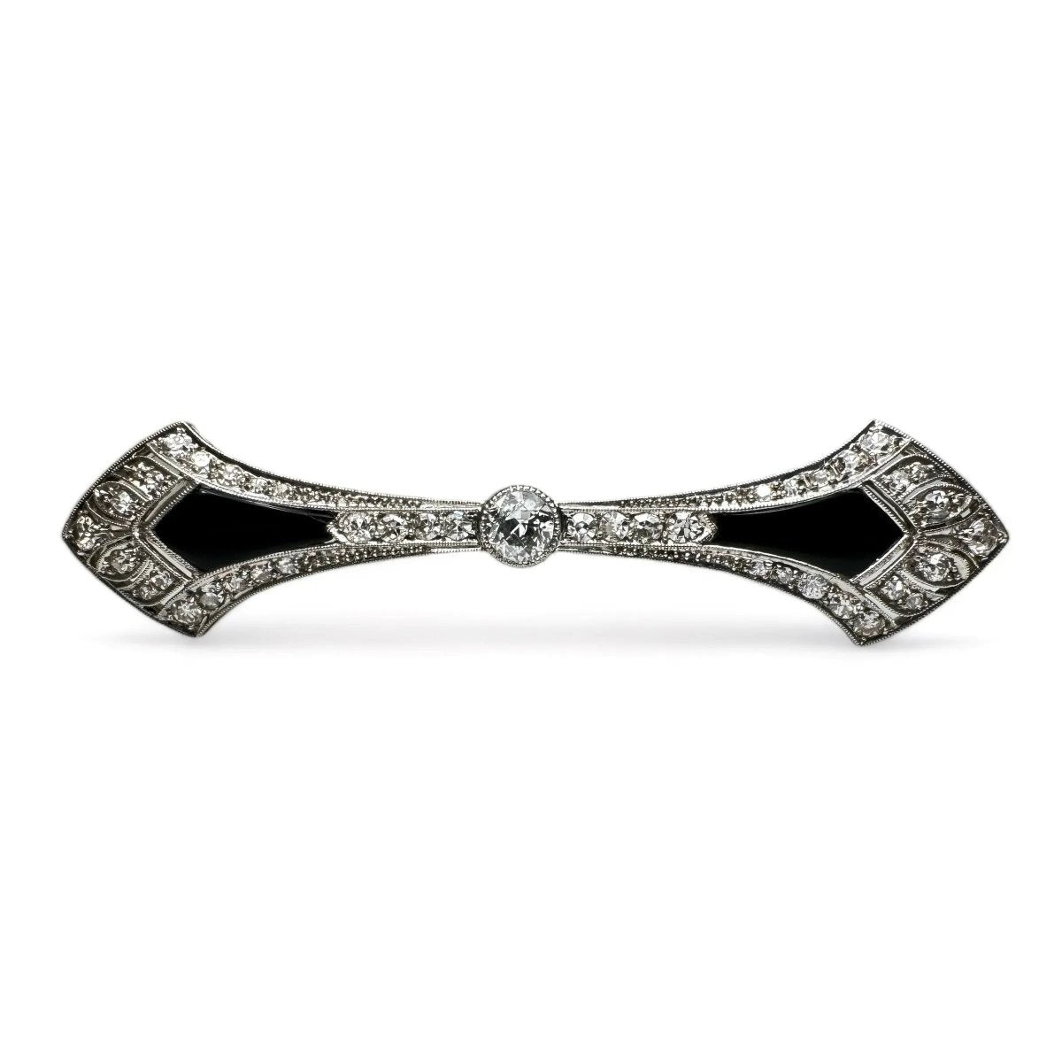 Broche barrette Art - Déco en platine, diamants et onyx. - Castafiore