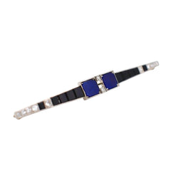 Broche Barrette en platine, lapis-lazuli, onyx et diamants - Castafiore