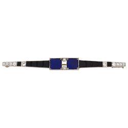 Broche Barrette en platine, onyx, lapis - lazuli et diamants - Castafiore
