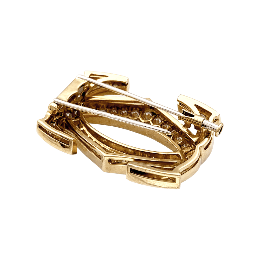 Broche CARTIER "Double C" en or jaune et diamants - Castafiore