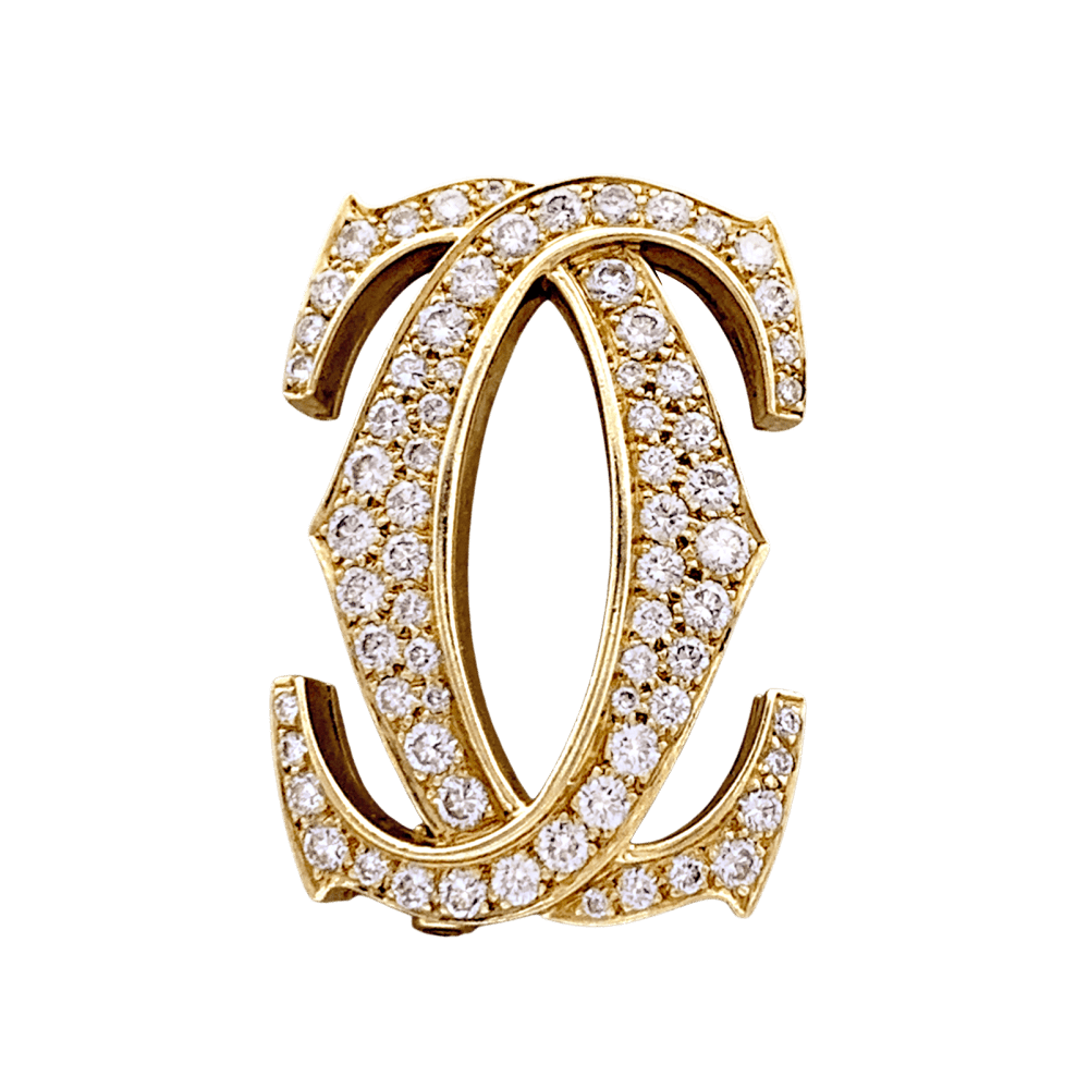 Broche CARTIER "Double C" en or jaune et diamants - Castafiore