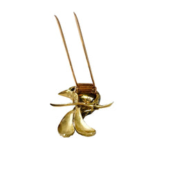 Broche CARTIER "Oiseau sur une branche" en or jaune, émail et rubis - Castafiore