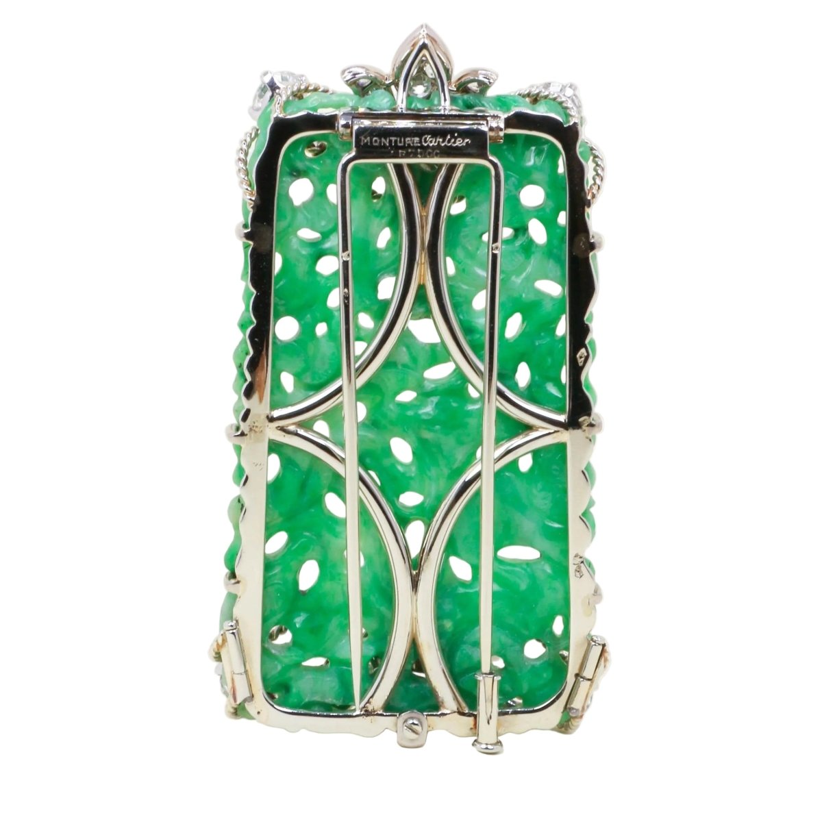 Broche Clip CARTIER en or blanc, platine, jade et diamants - Castafiore