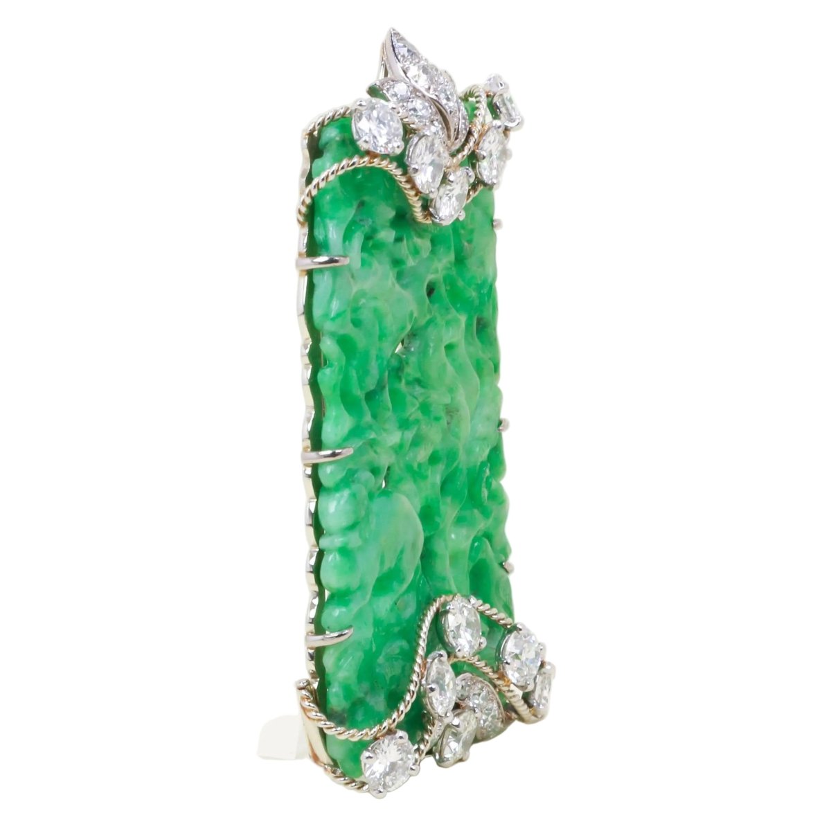 Broche Clip CARTIER en or blanc, platine, jade et diamants - Castafiore
