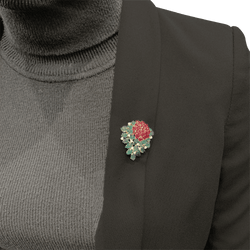 Broche Clip en or jaune, rubis, émeraudes et diamants - Castafiore