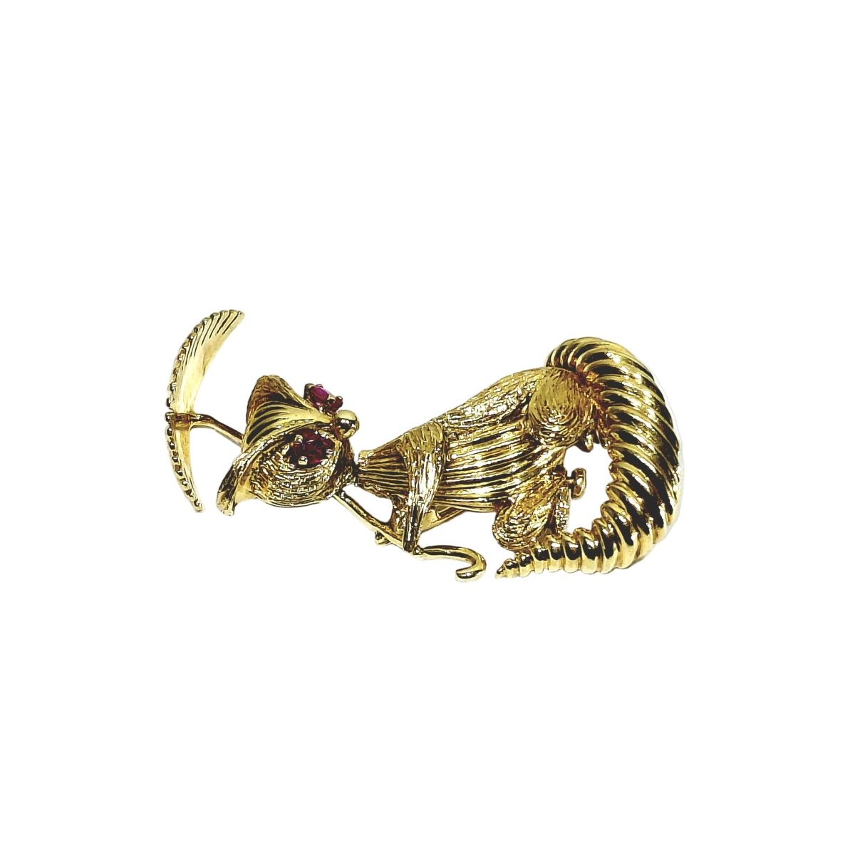 Broche en or champagne et rubis - Castafiore