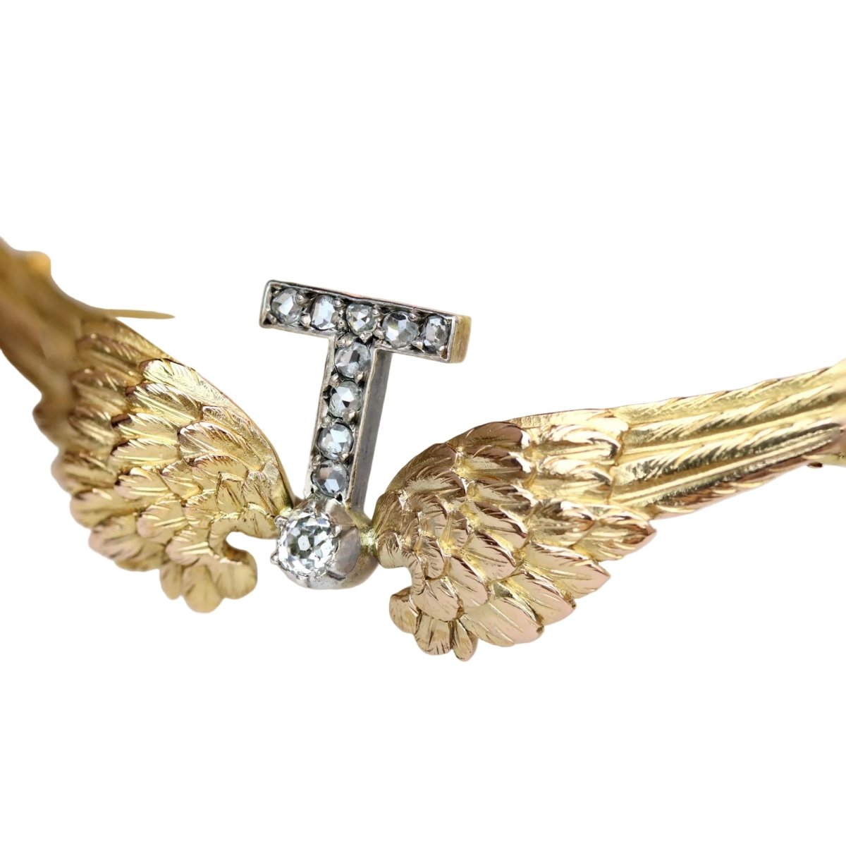 Broche en or jaune, argent et diamants - Castafiore
