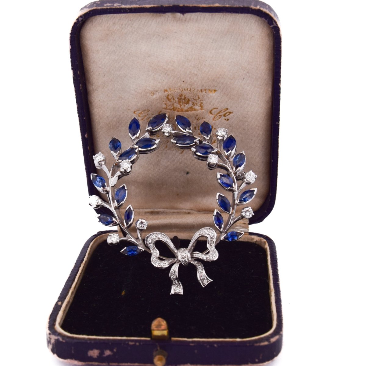 Broche Épingle en or blanc, saphirs et diamants - Castafiore