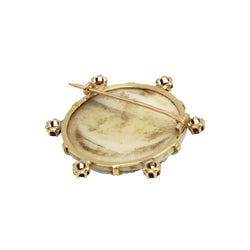 Broche Épingle en or jaune, camée coquillage et grenats - Castafiore