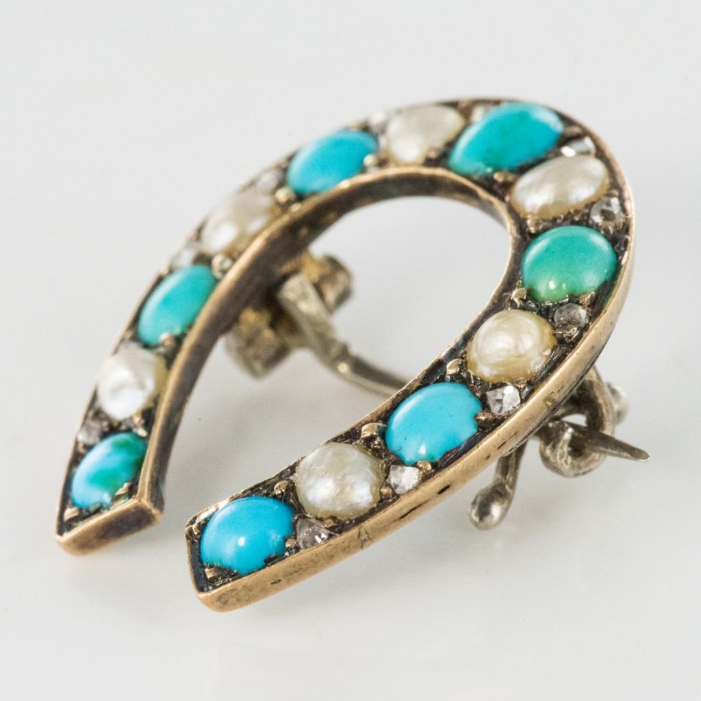 Broche fer à cheval turquoises perles fines diamants - Castafiore