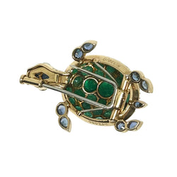 Broche GUBELIN en or jaune, émeraudes, saphirs et diamants - Castafiore