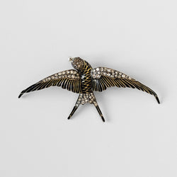 Broche "hirondelle" en or jaune et argent - Castafiore
