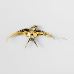 Broche "hirondelle" en or jaune et argent - Castafiore