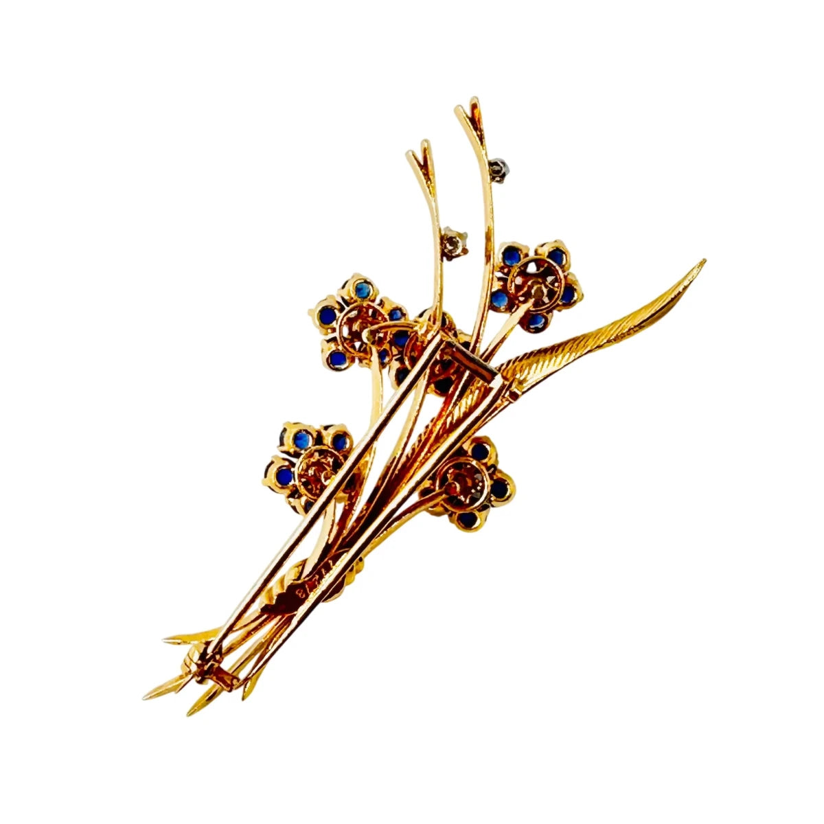 Broche VAN CLEEF & ARPELS "Bouquet Hawaï" en or jaune, platine, saphirs et diamants - Castafiore