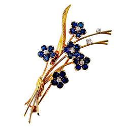 Broche VAN CLEEF & ARPELS "Bouquet Hawaï" en or jaune, platine, saphirs et diamants - Castafiore